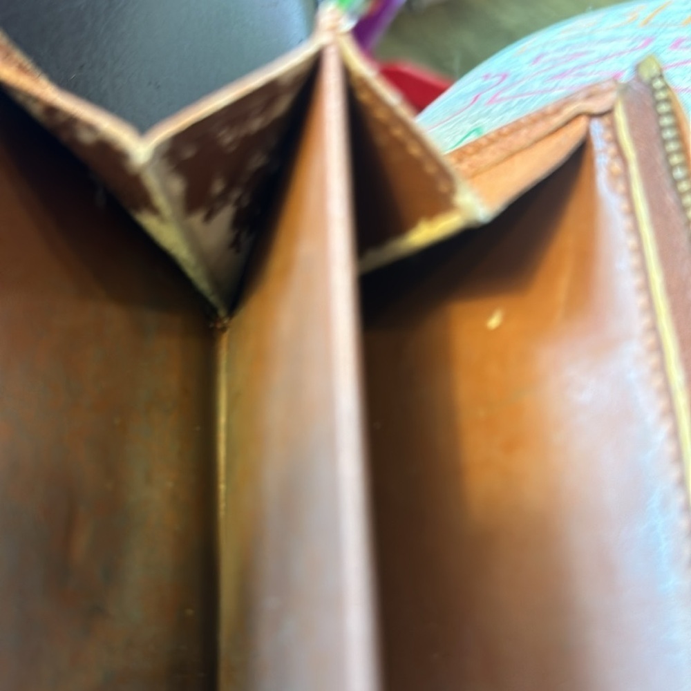 Louis Vuitton billfold. The dimensions are 6 inches wide and 4 inches. Authentic - Picture 6 of 10